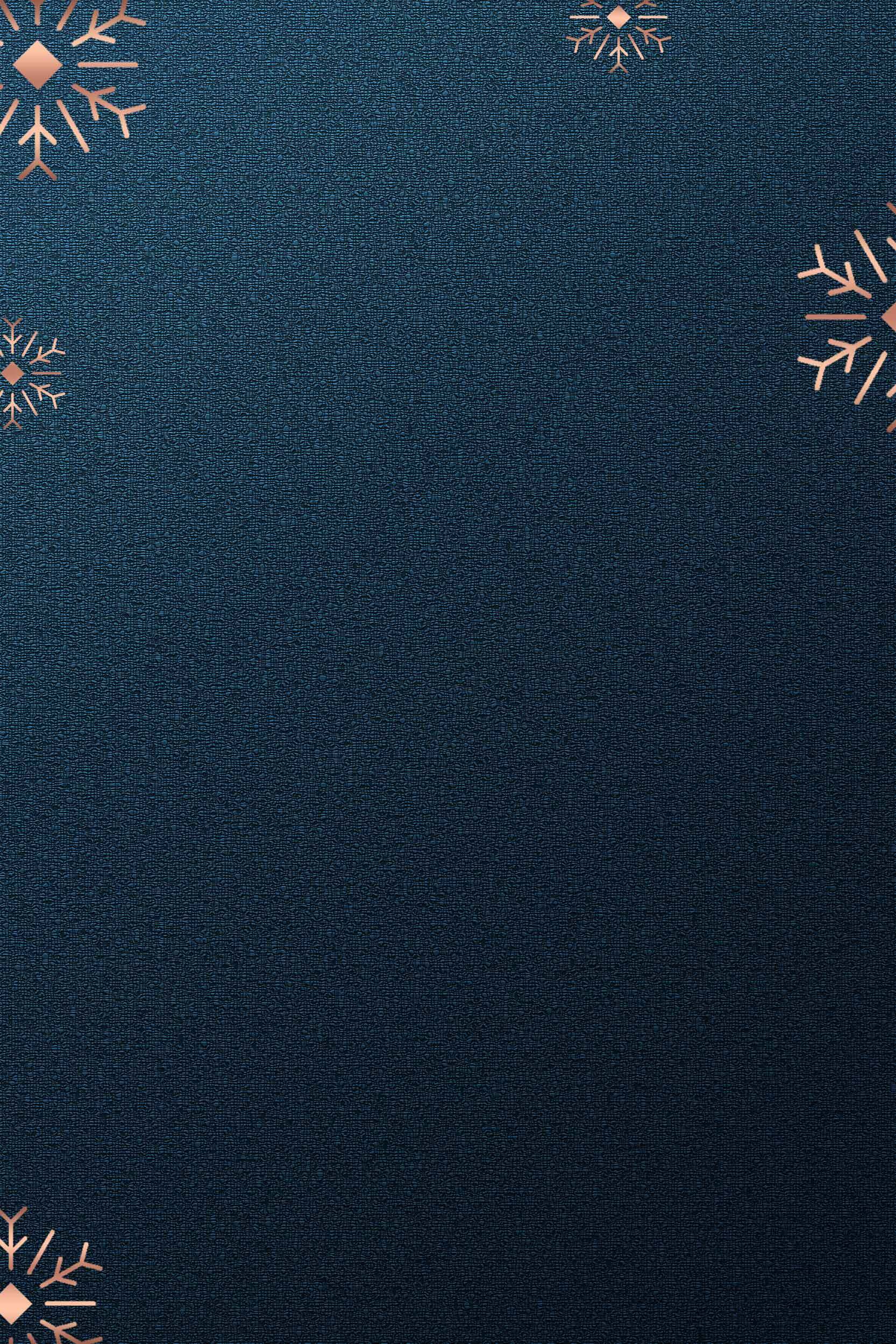 深蓝色背景与金色雪花设计的冬季主题图片素材